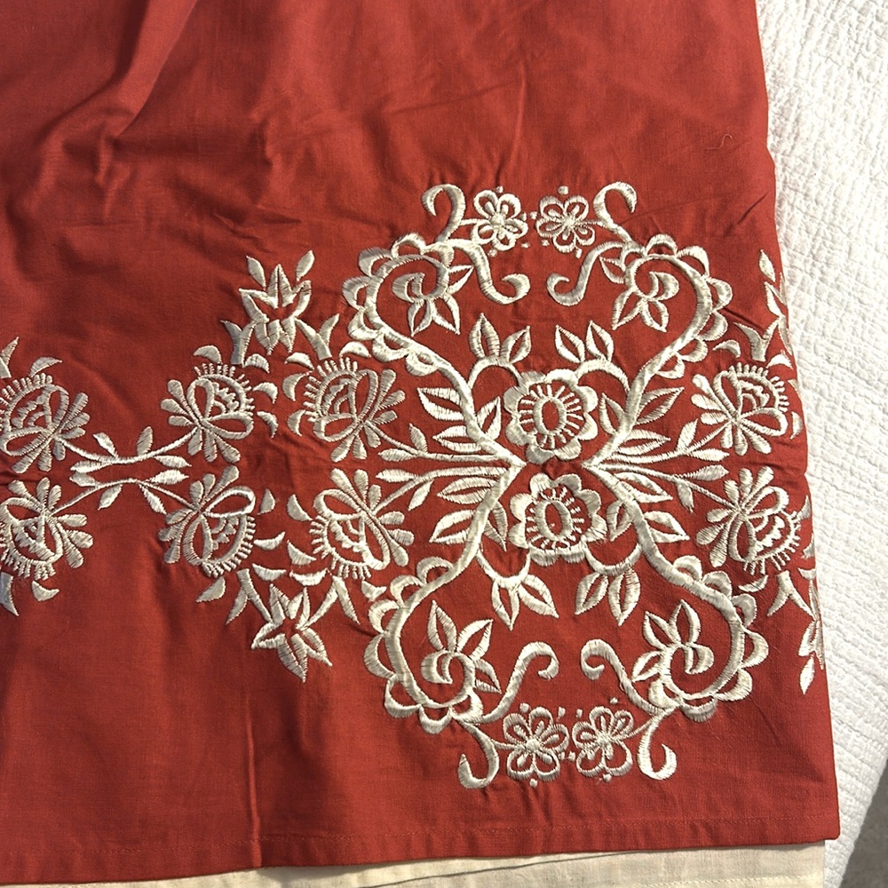 Never used. Anthropologie blackout red-orange Indian curtains (set of 2).